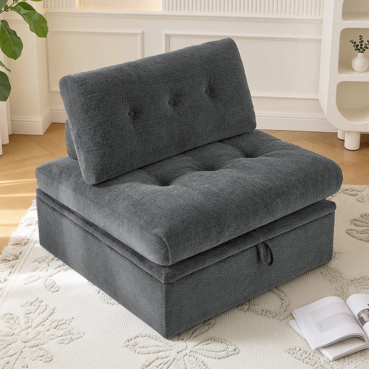 A 3/4 side angle view showing the Korser gray 1-seater modular armless single sofa chair with backrest and storage.