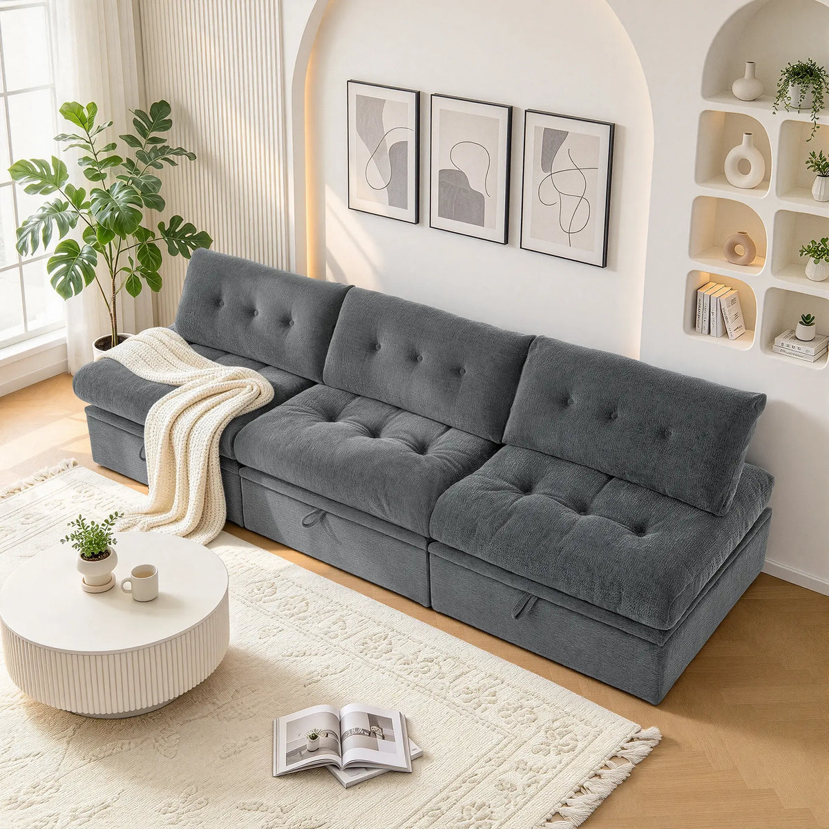 3/4 angle view of the Korser gray 3-seater straight modular storage sofa with backrests in a bright living room.