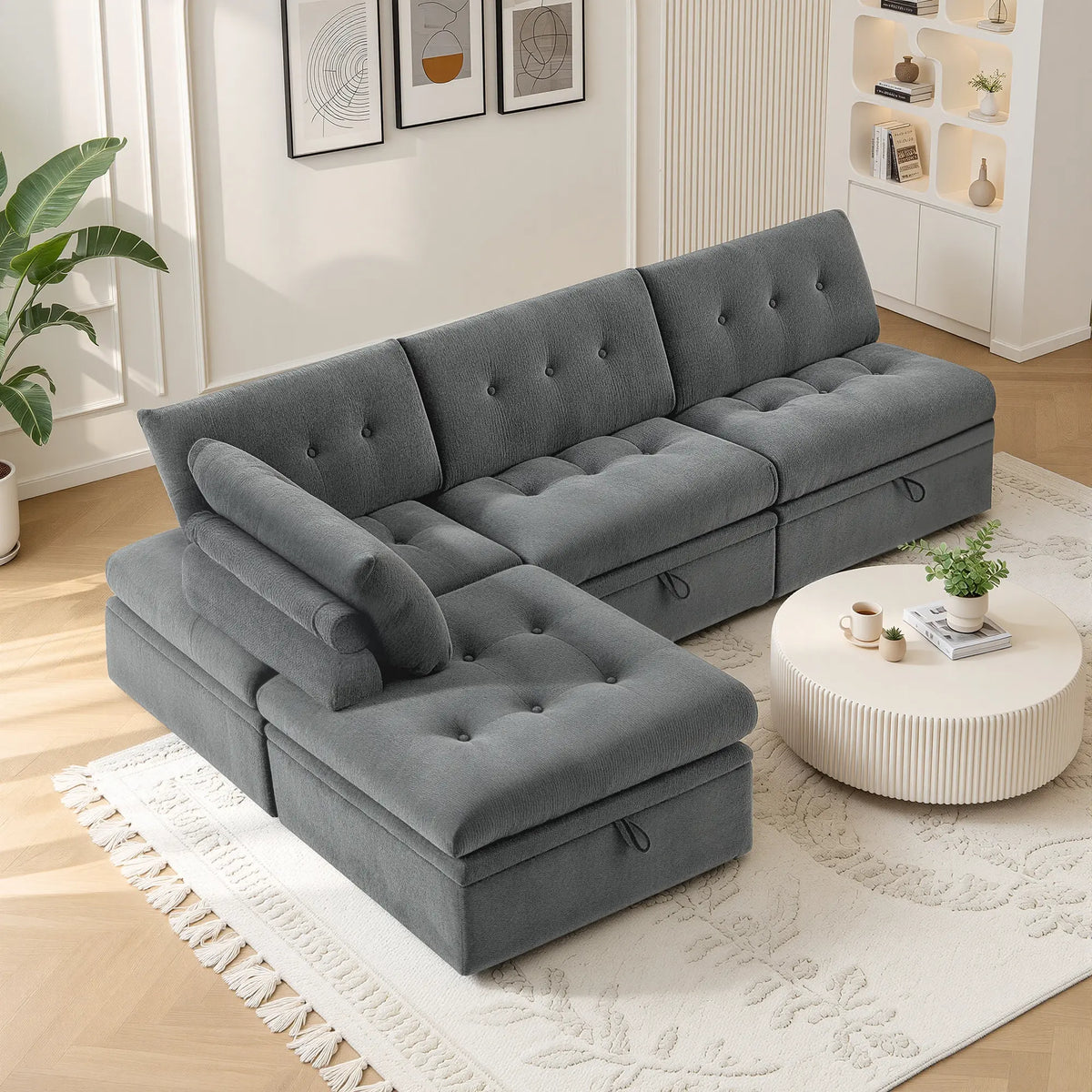 Side angle view of a Korser gray 4-seater L-shaped modular sectional sofa with backrests in a living room setup.