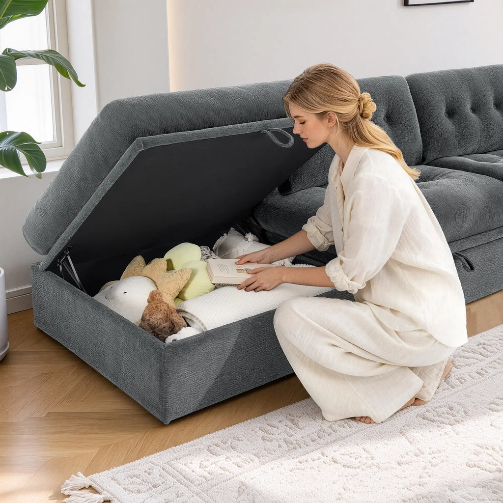 Close-up view showing the under-seat hidden storage function of a Korser gray modular sofa module.