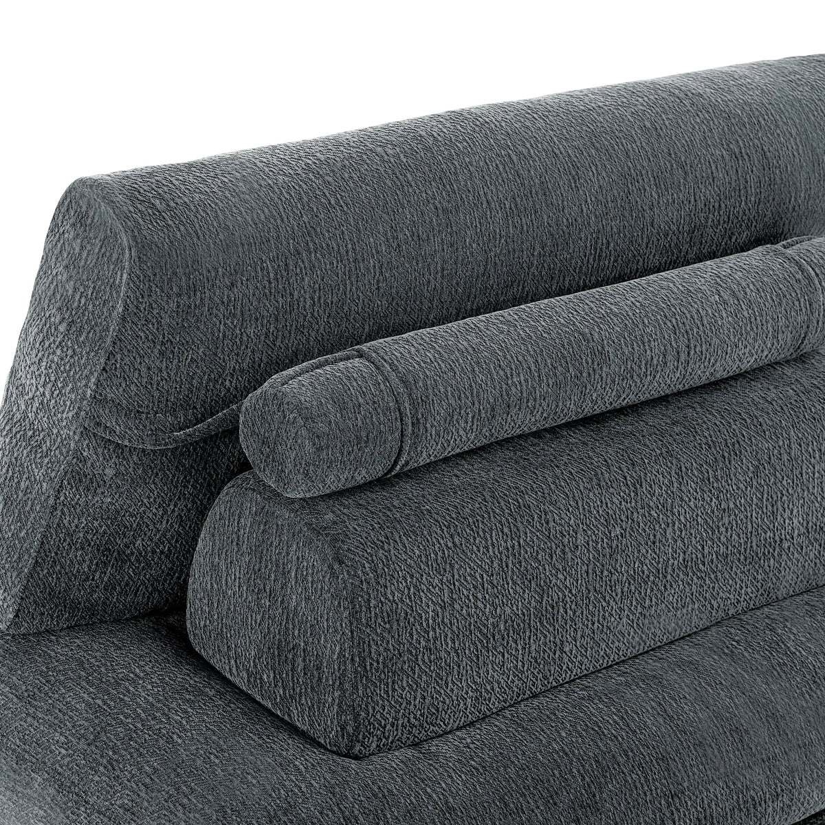 Close-up of the Korser grey fabric sofa, highlighting the soft cylindrical pillow and textured backrest.