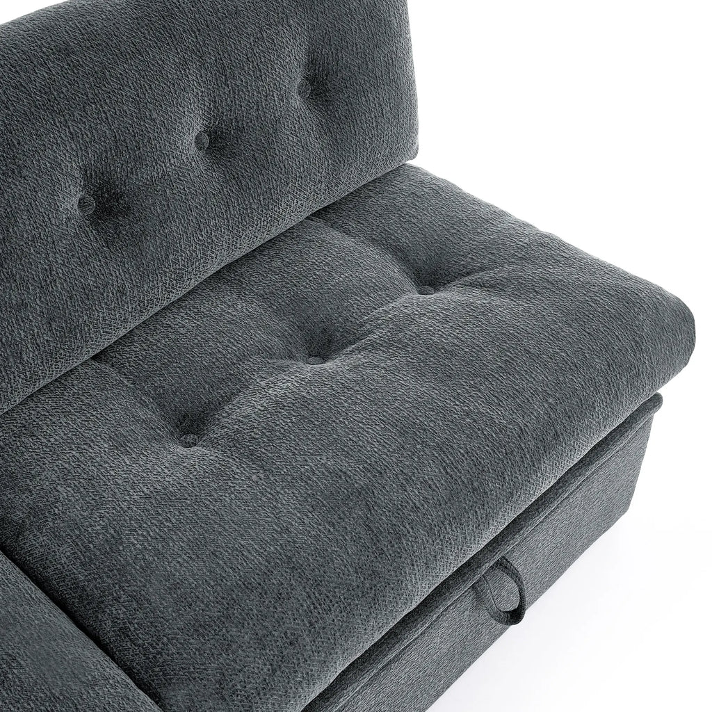 Close-up of the Korser grey fabric sofa, showing the tufted button detail and the storage handle.