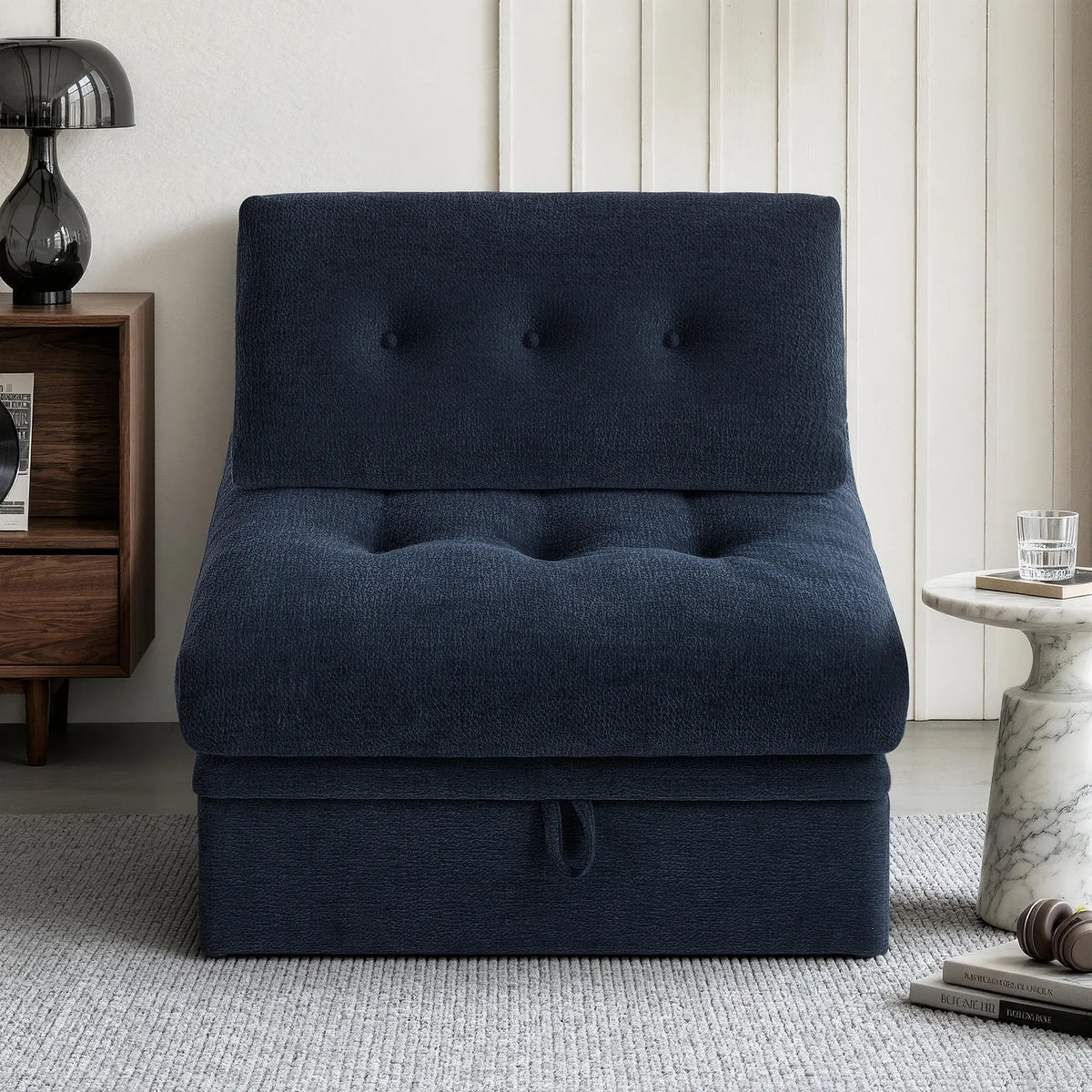Front straight-on view of the Korser navy blue 1-seater modular armless single sofa chair with backrest and storage base.