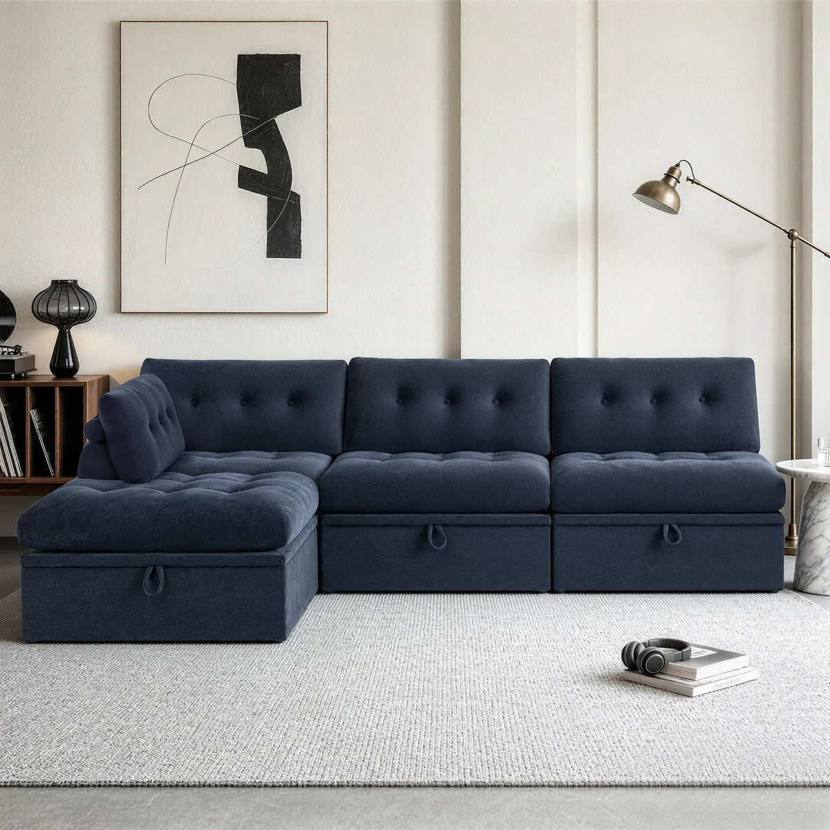 Side angle view of a Korser navy blue 4-seater L-shaped modular sectional sofa with backrests.